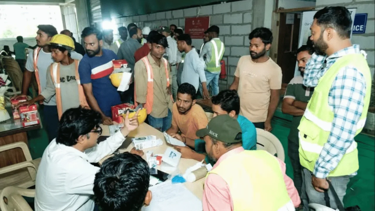 Indian workers participating in a social protection activity